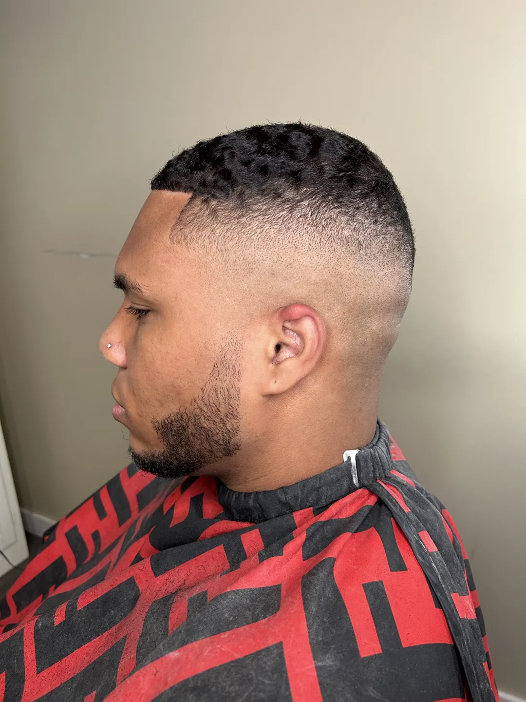 High skin fade with short textured crop — cut at Studio K, Guelph